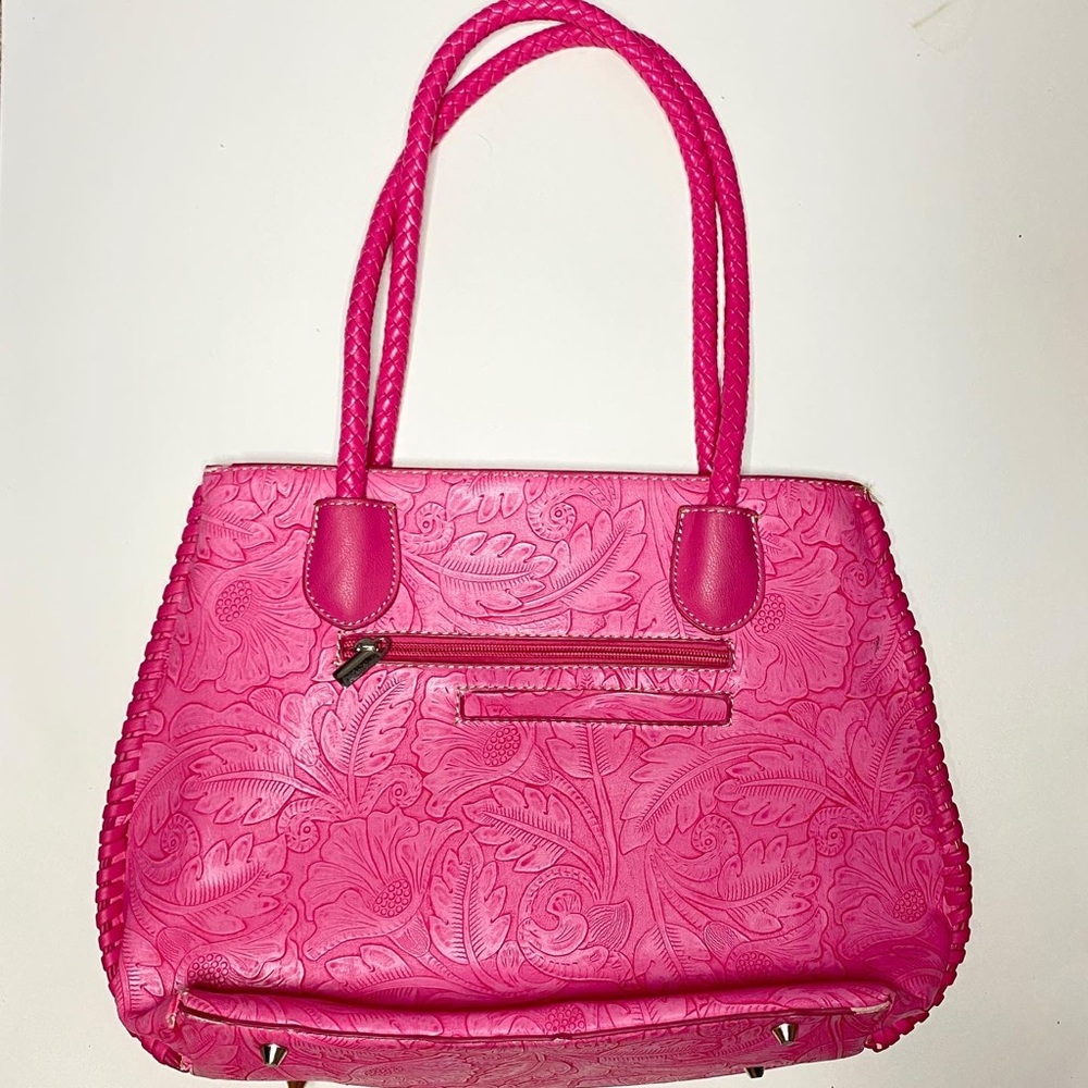 Pink handbag with floral design